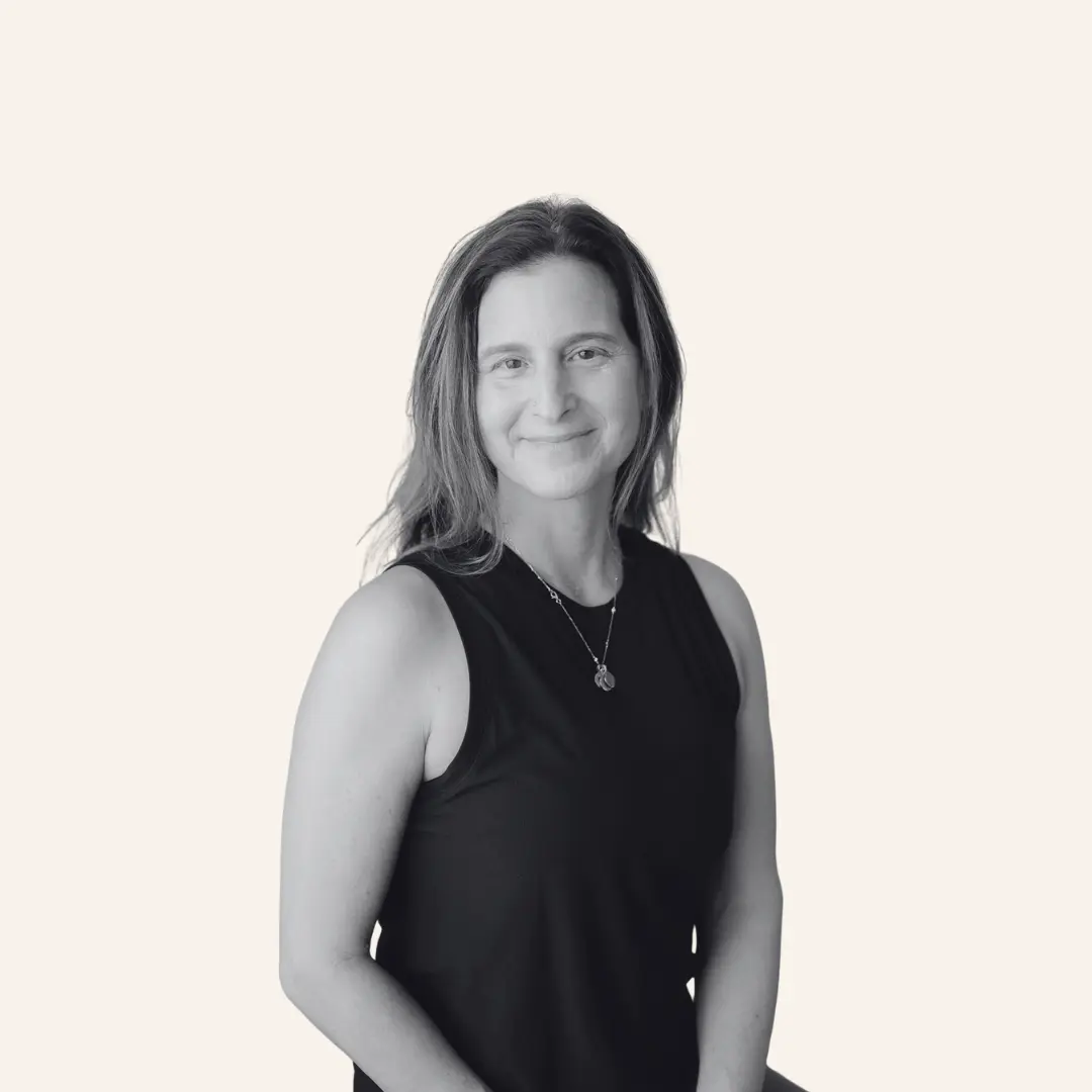 Aimee Elsner is the owner of Power Yoga Collective in Stamford and Pound Ridge, alongside her husband Tim. A 500 Hour Registered Yoga teacher and occupational therapist, she's spent a decade building thriving studio communities rooted in the belief that yoga helps people feel seen, supported, and fully alive.